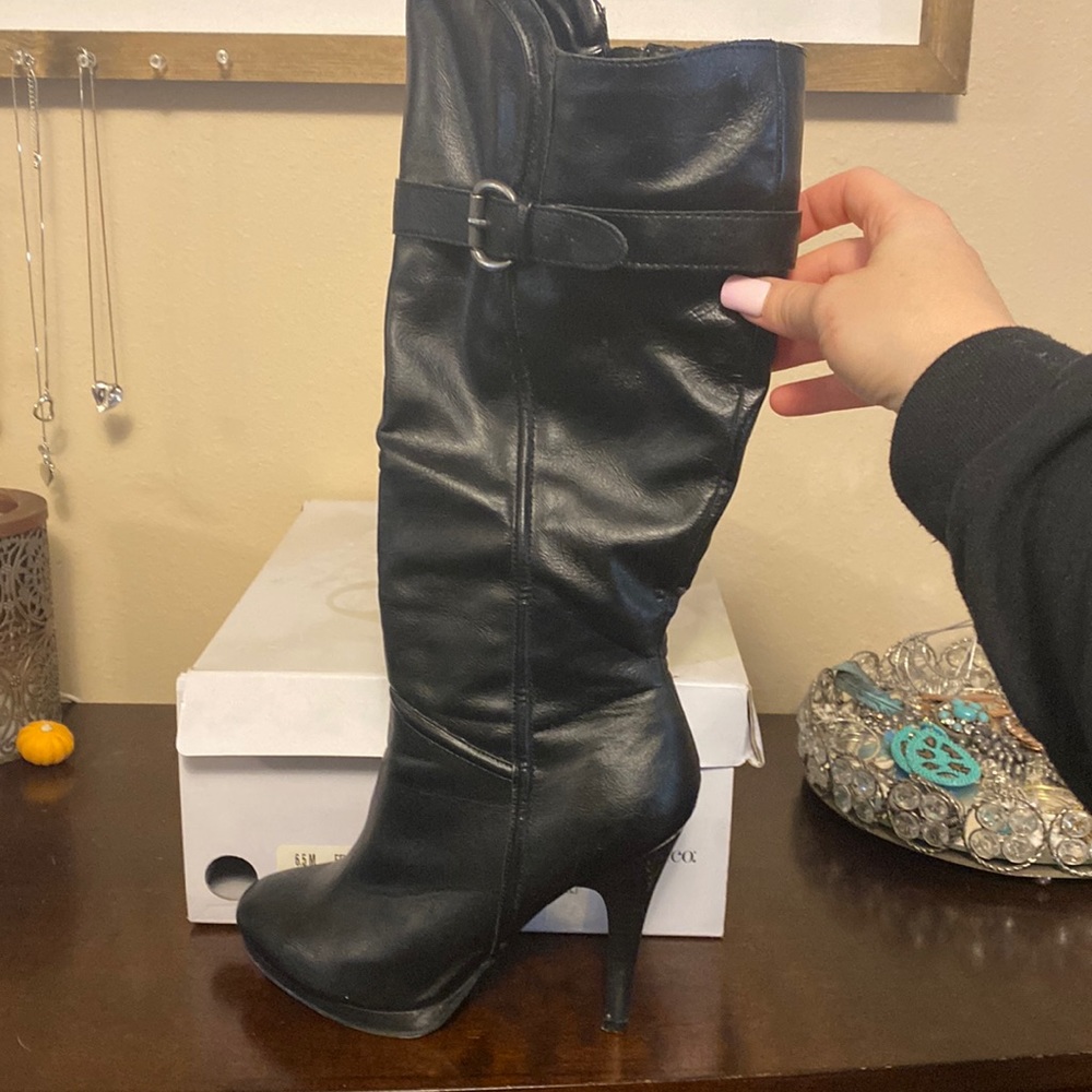 Black high heeled boots